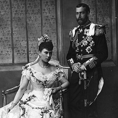 6th July 1893: King George V (1865 - 1936) on his wedding day with his bride Princess Mary of Teck (1867 - 1953) seated. (Photo by Hulton Archive/Getty Images)
